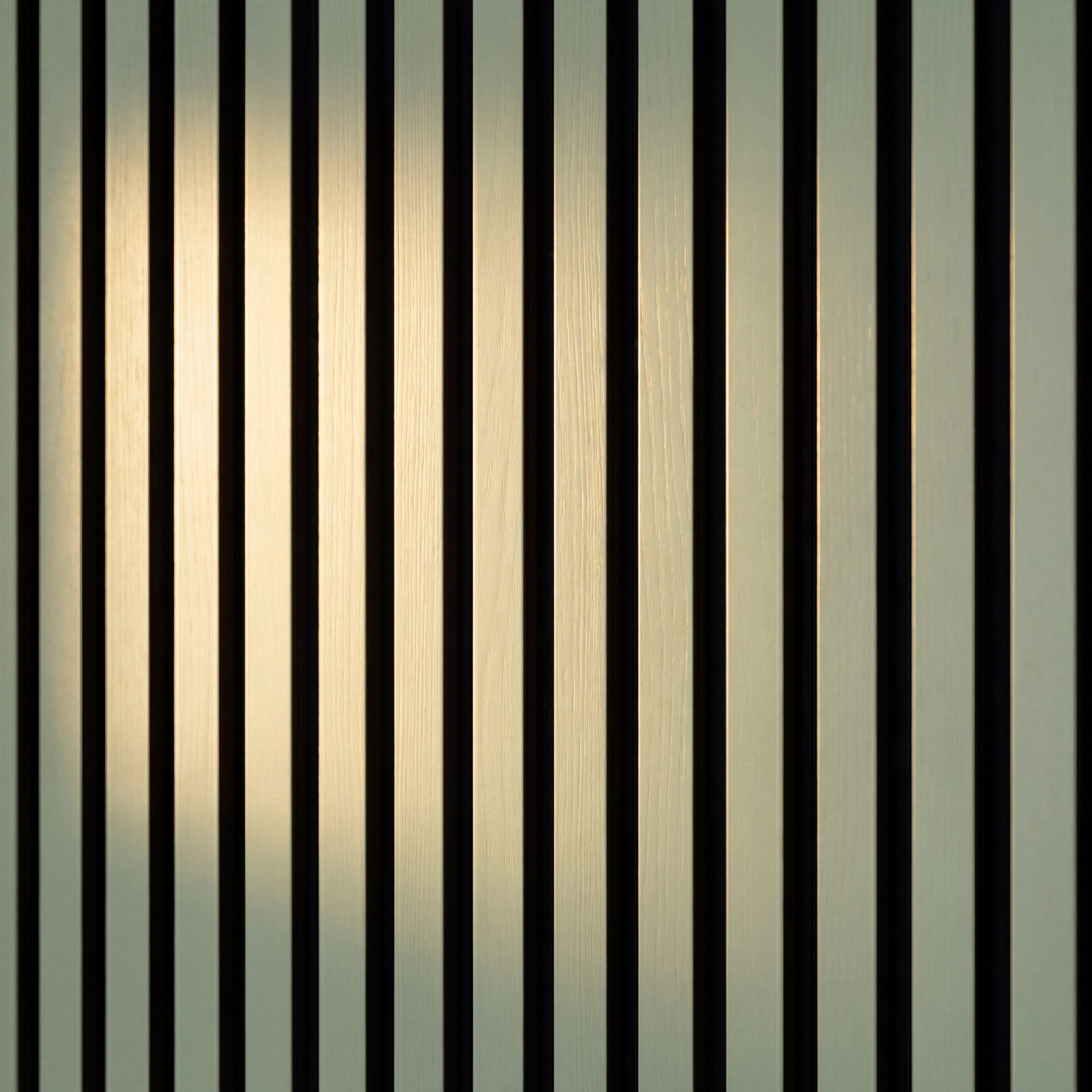 Close-up of Sage Green Melamine Acoustic Wall Panel slats showing the muted green finish, vertical profile and black acoustic felt backing.